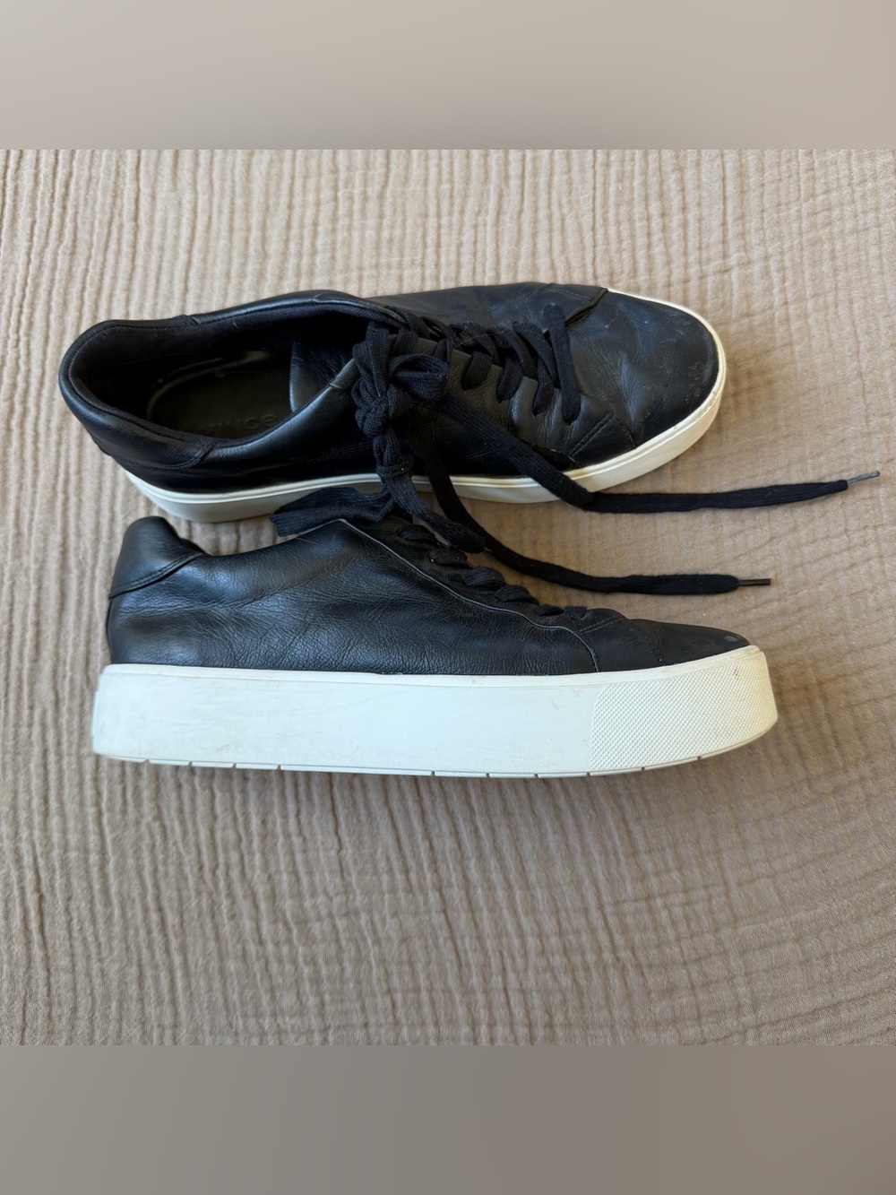 Women’s black platform Vince sneakers